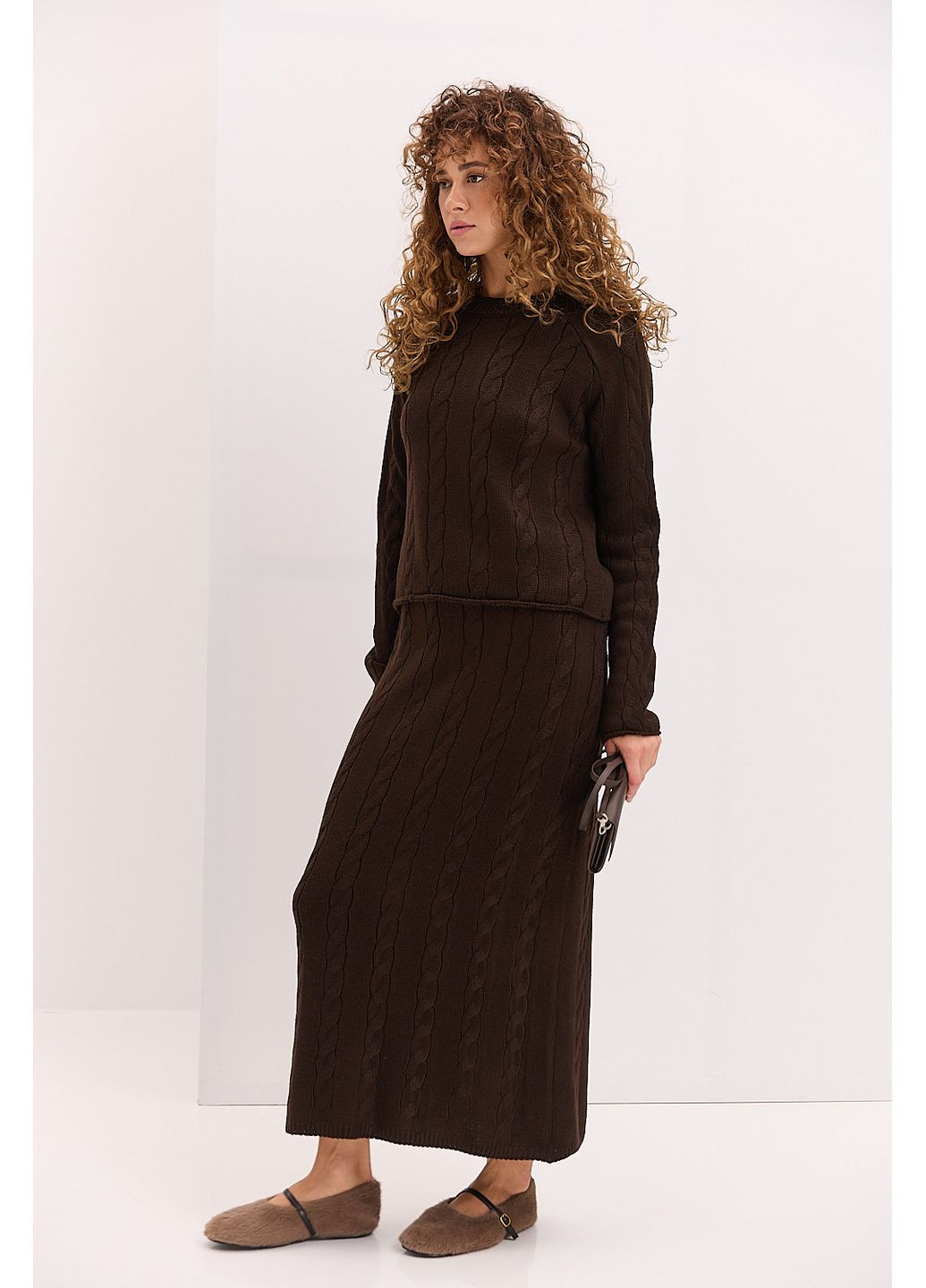 Жіночий вязаний костюм зі спідницею і джемпером чорний Arjen (361056672)