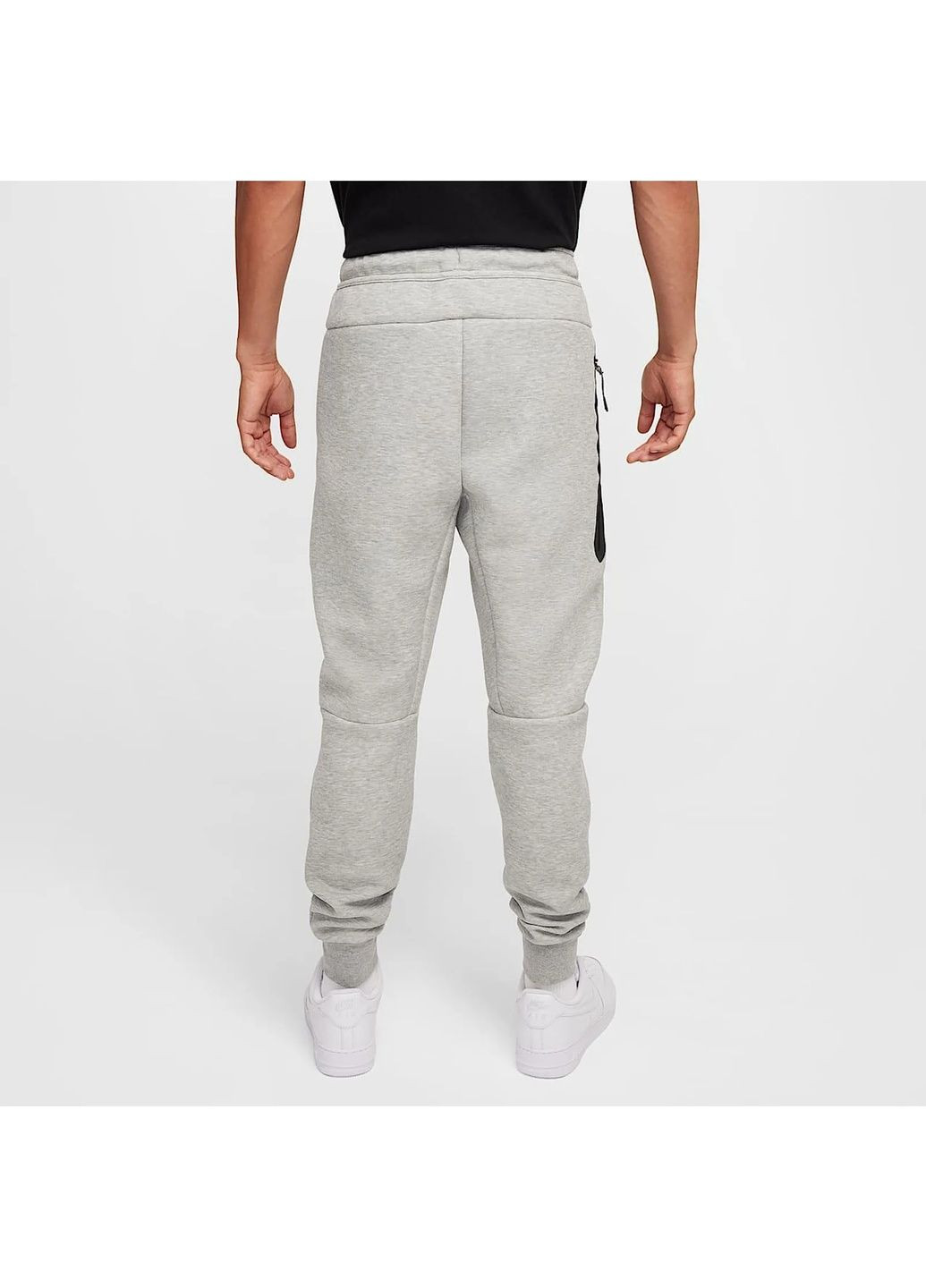 Серые демисезонные брюки Nike