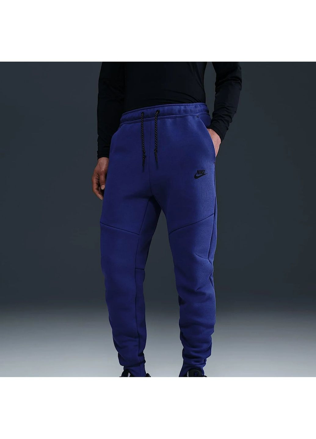 Синие демисезонные брюки Nike