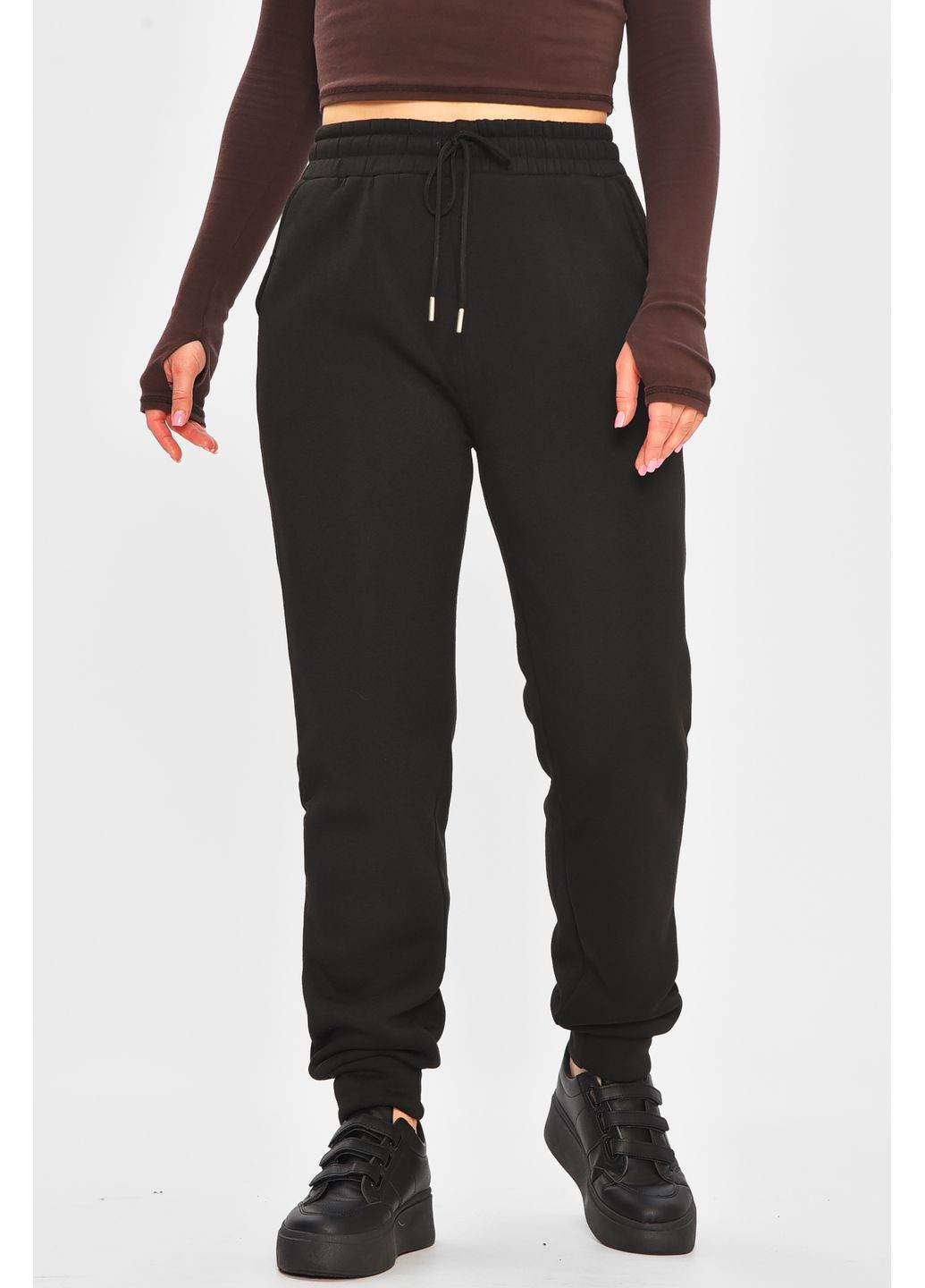 Спортивні жіночі штани на флісі чорного кольору Let's Shop (364485122)