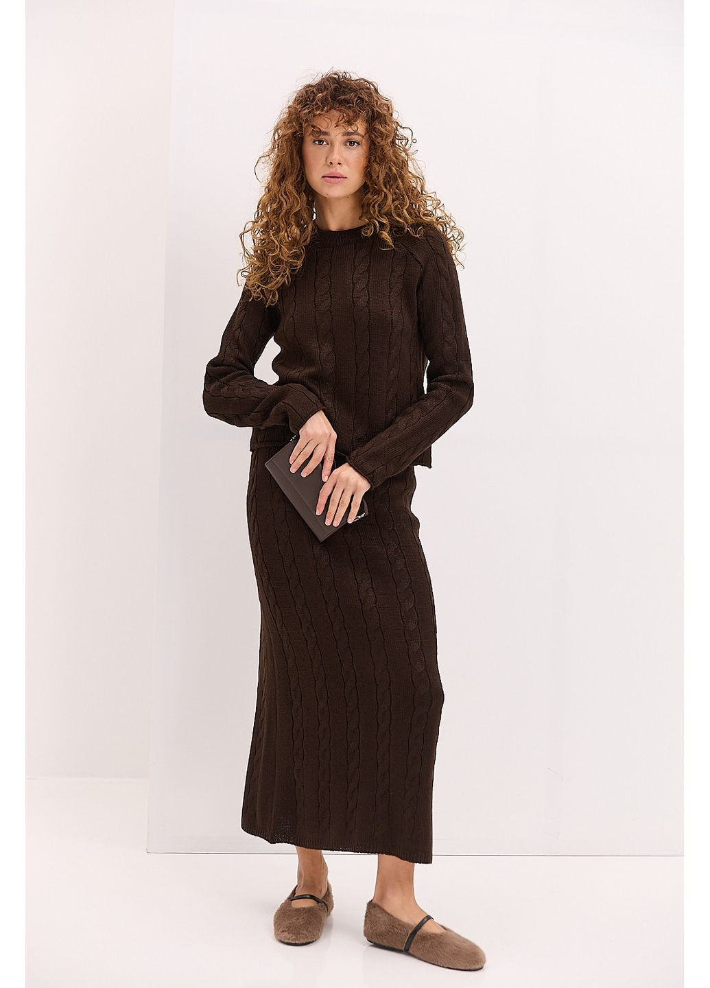 Жіночий вязаний костюм зі спідницею і джемпером чорний Arjen (361056672)