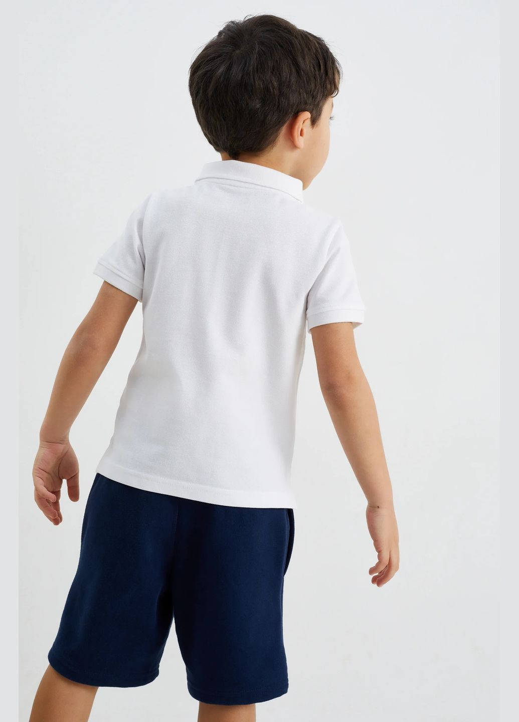 Белая детская футболка-поло из хлопка C&A однотонная