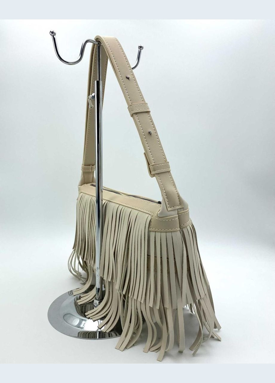 Жіноча шкіряна сумка багет з бахромою «Доггі» бежева з регульованим ремінцем WeLassie (298568995)