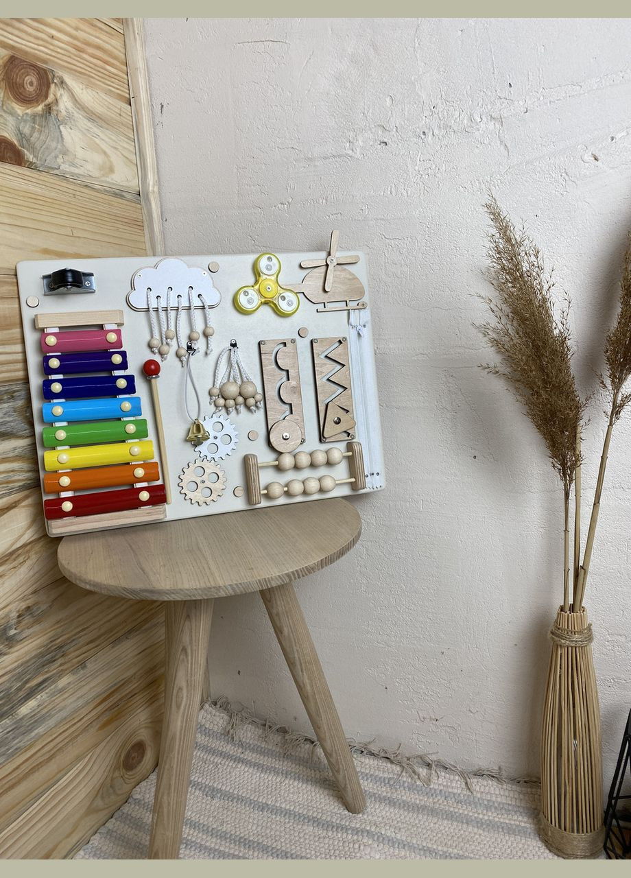 Бізіборд в кольорі дерева з ксилофоном 30х40 см No Brand (348357612)