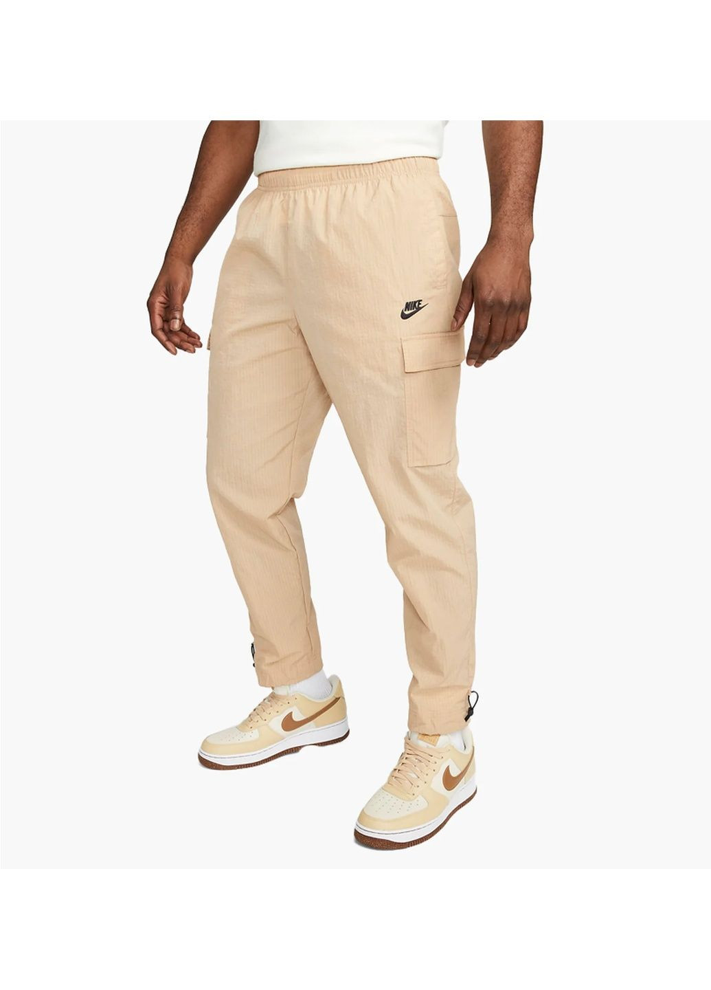 Бежевые демисезонные брюки Nike