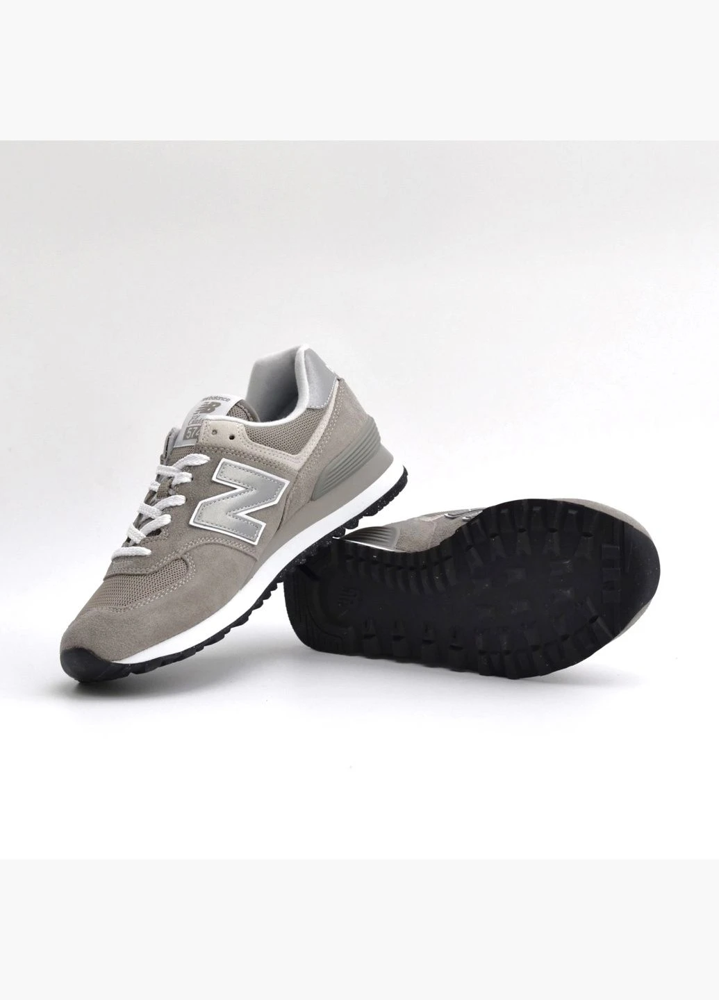 Серые демисезонные мужские кроссовки 574 classic gl grey ml574evg New Balance