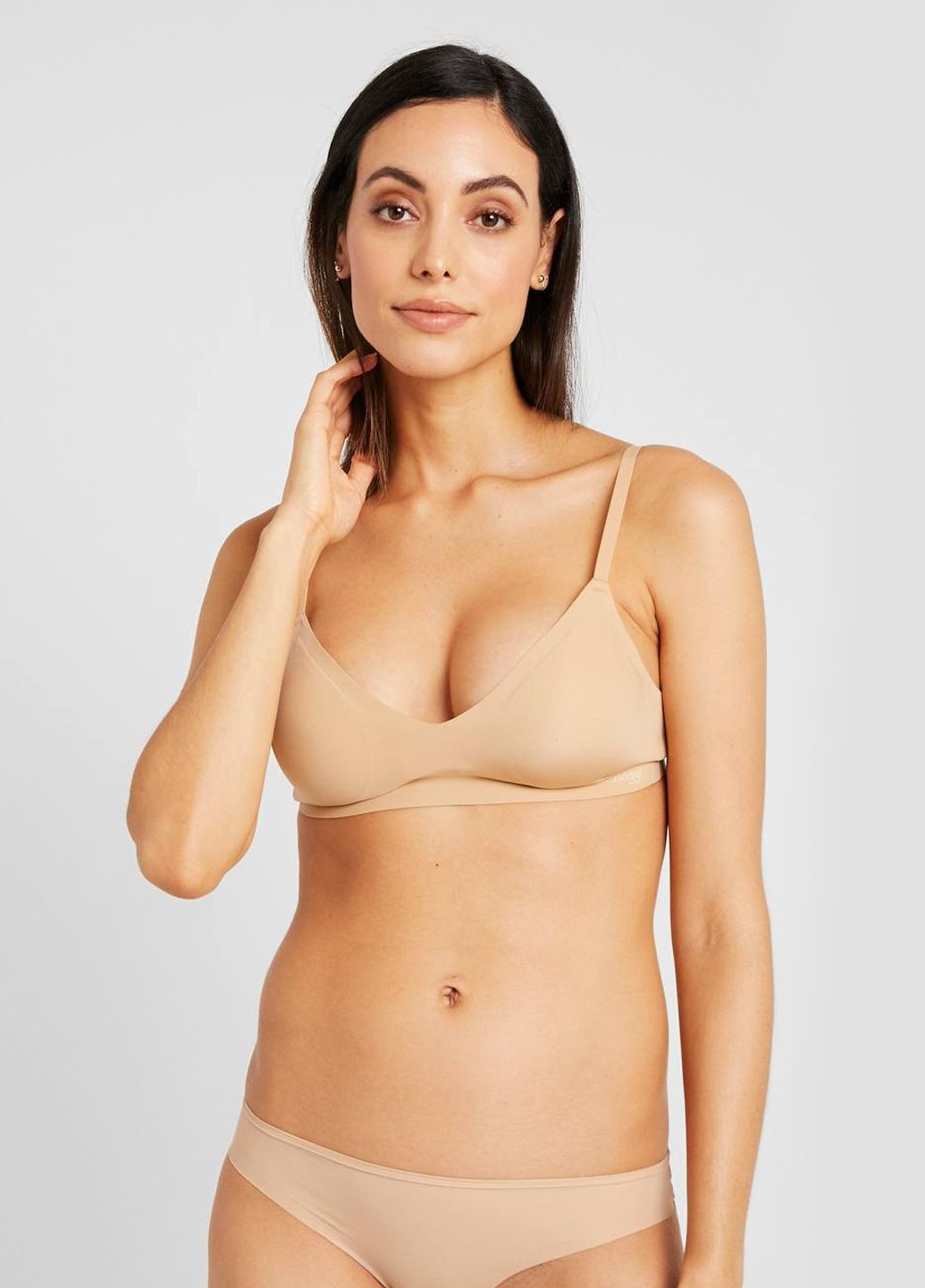 Бежевий бюстгальтер Sloggi