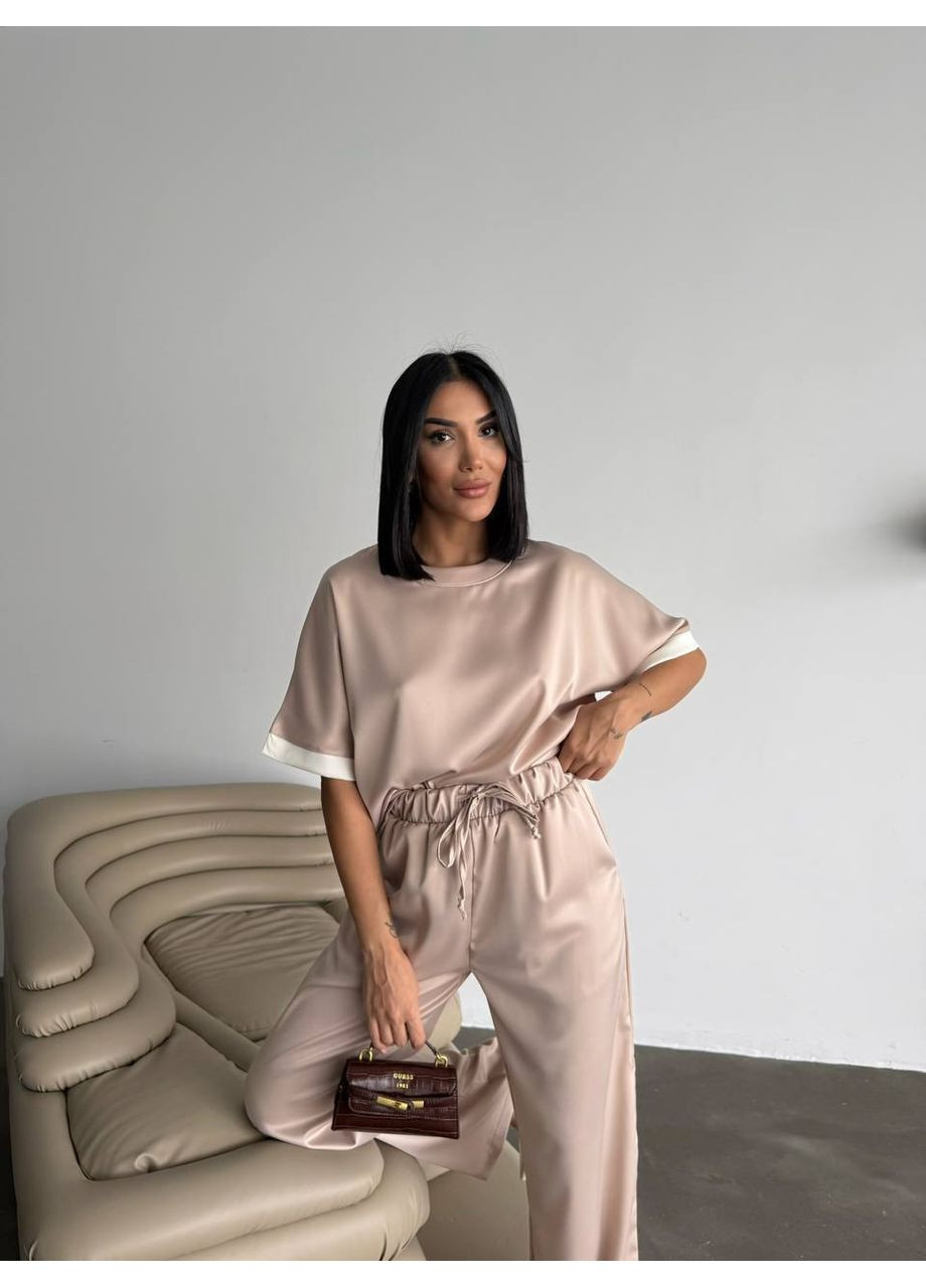 Жіночий костюм з легкої струмкої тканини Україна (358644020)