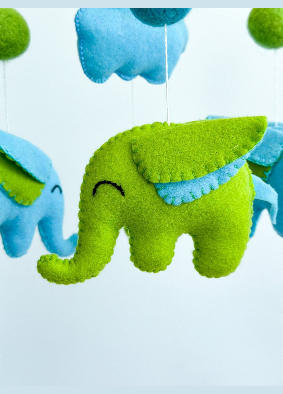 Дитячий музичний мобіль на ліжечко для немовлят WooolyWool «Слоненята» з 35 мелодіями No Brand (342757890)