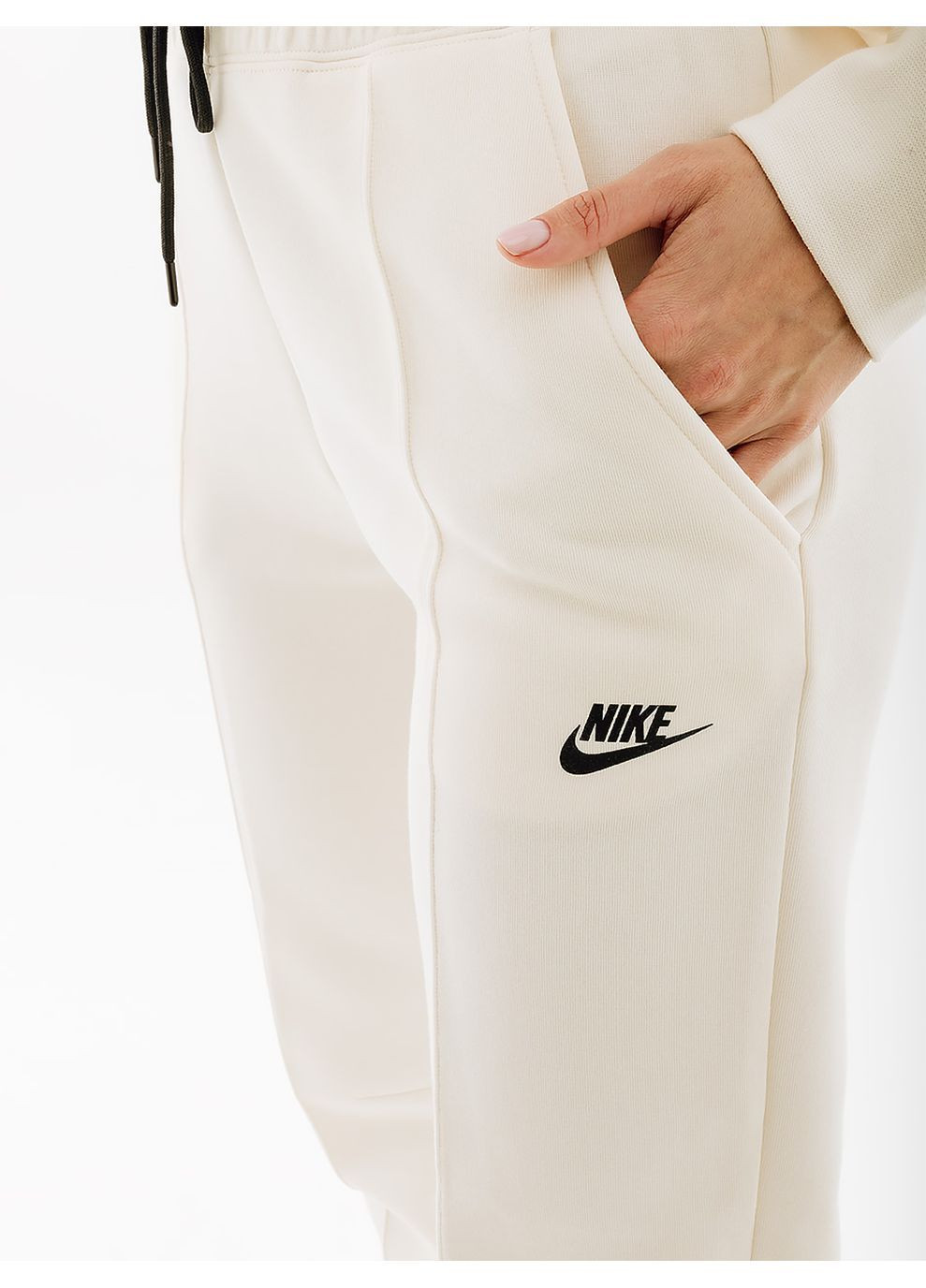 Белые спортивные демисезонные брюки Nike