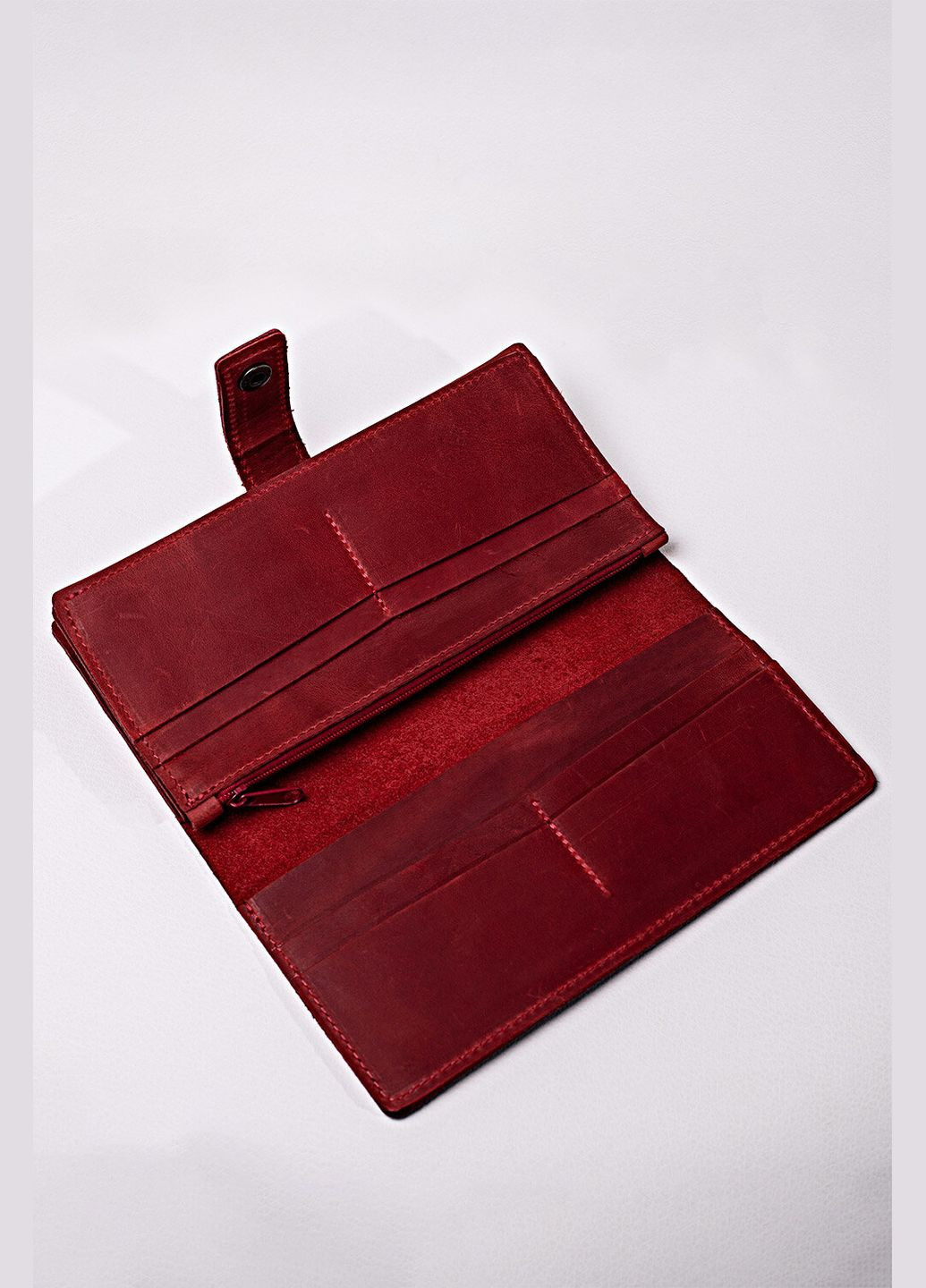 Шкіряний гаманець "Крейзі" на кнопці із замочком червоного кольору VOLMAS (316302477)