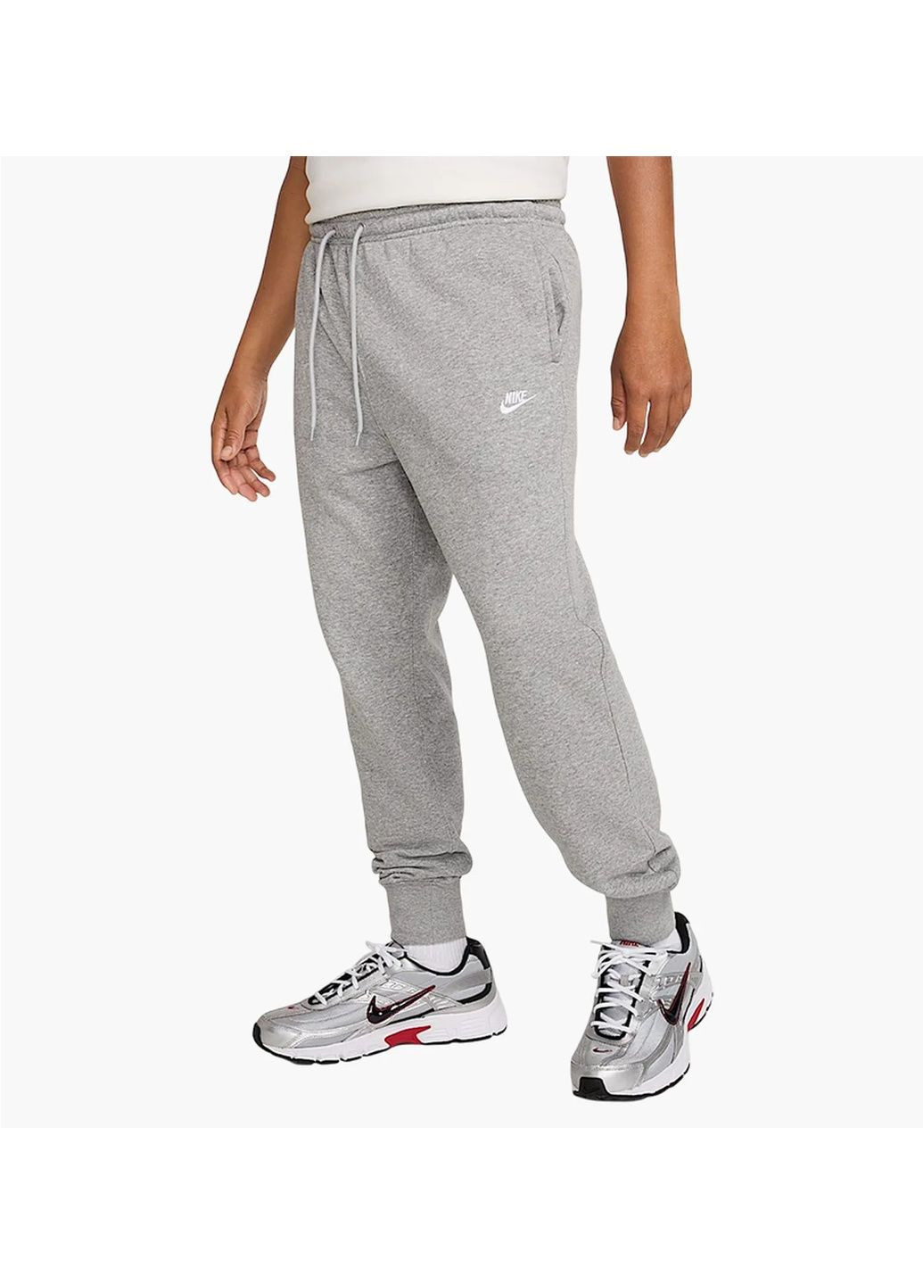 Серые демисезонные брюки Nike