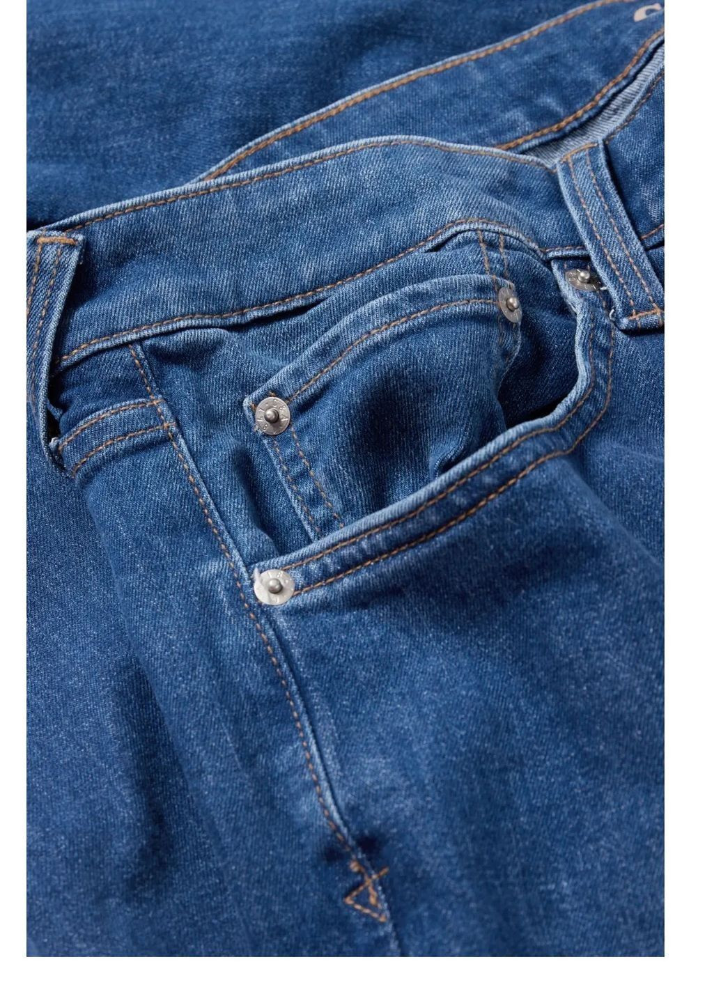 Синие демисезонные джинсы C&A