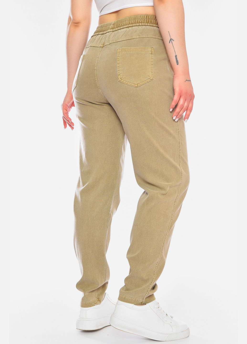 Штани жіночі однотонні бежевого кольору Let's Shop (322765423)