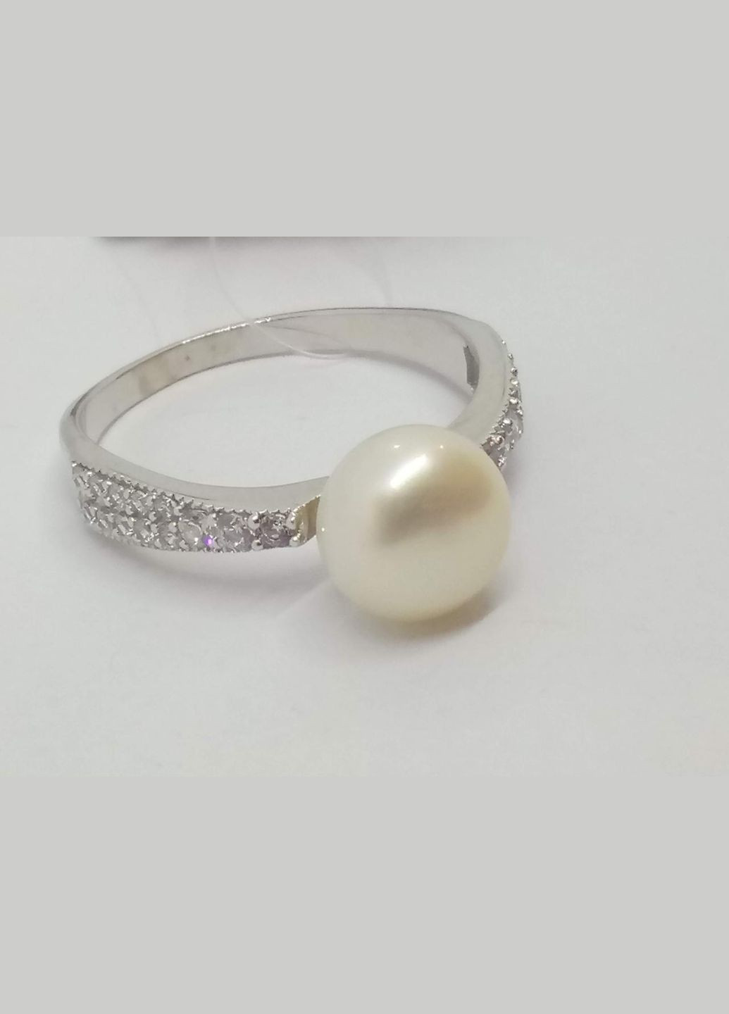 Серебряное кольцо с топазом и фианитами. 901-00290-10 Qvaliz (319209069)