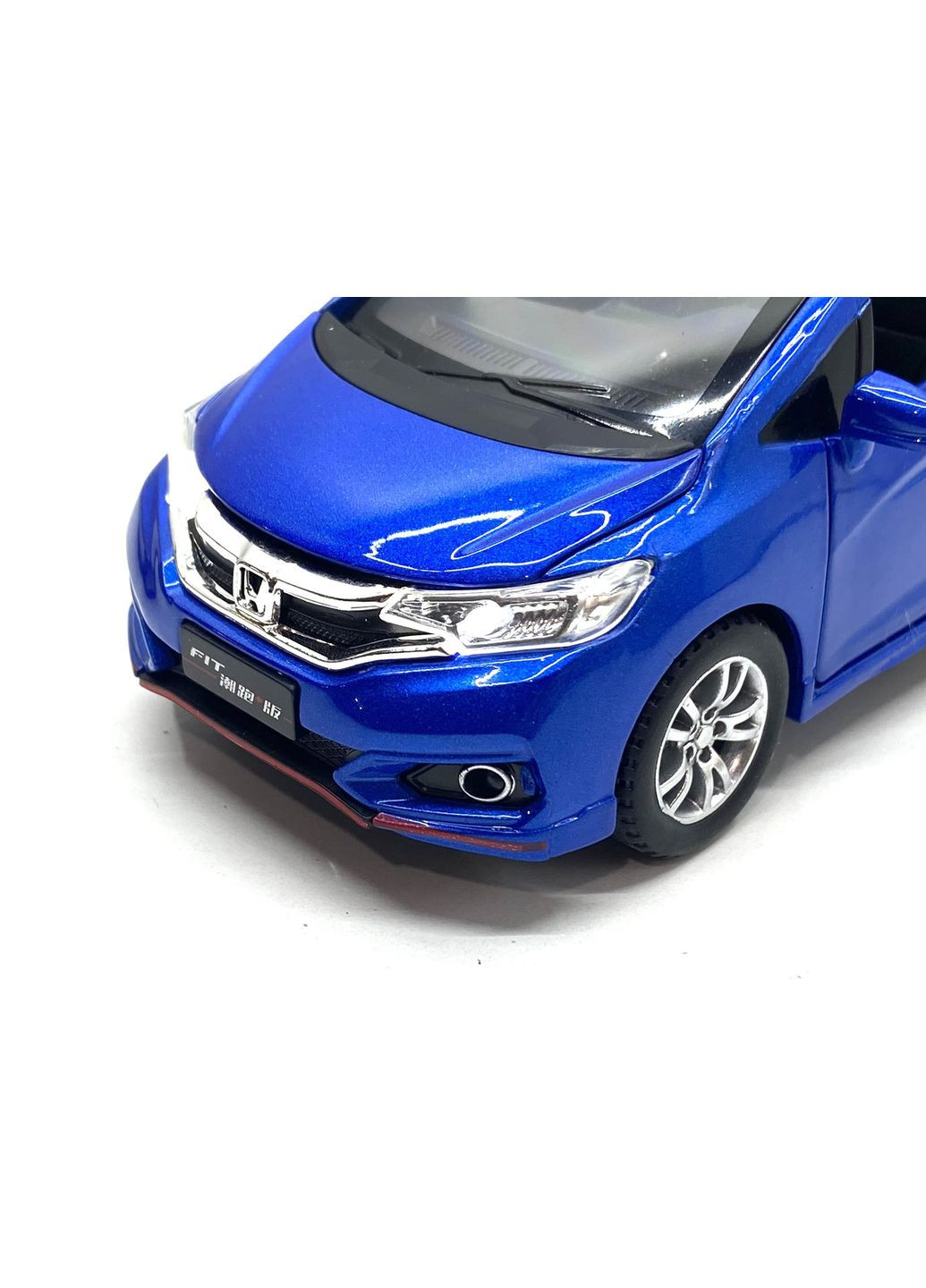 Машинка металлическая TK Union Honda fit 1:32 свет звук открываются двери Синяя (GT-04600) TK Union Group (301421792)