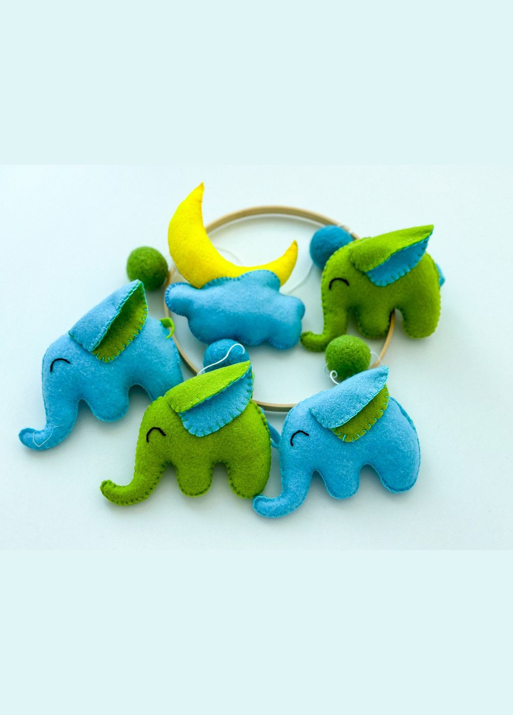 Дитячий музичний мобіль на ліжечко для немовлят WooolyWool «Слоненята» з 35 мелодіями No Brand (342757890)