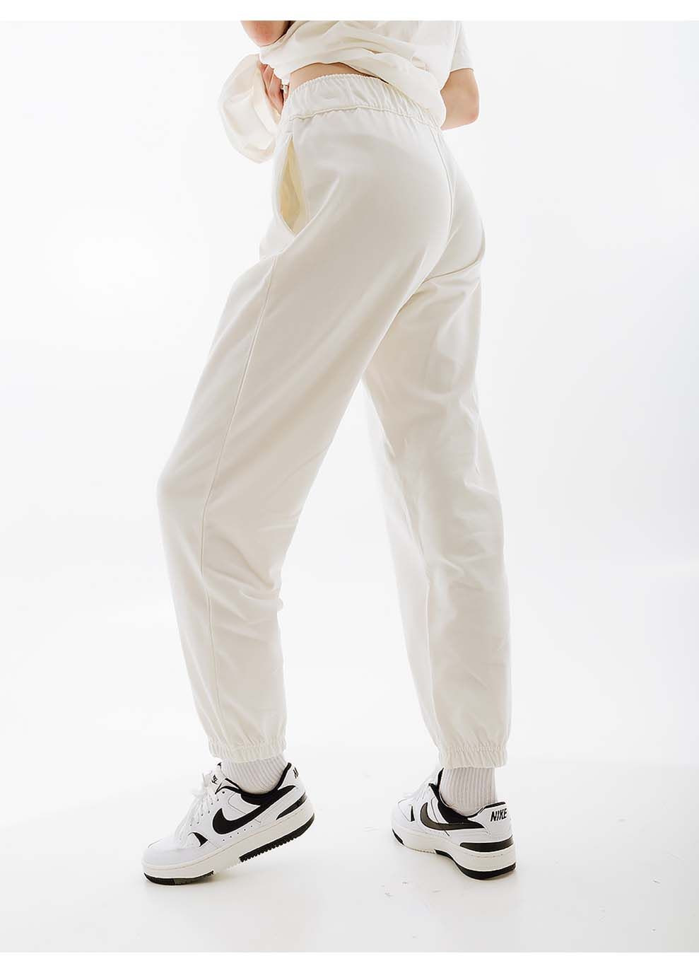 Женские Брюки W NSW JRSY EASY JOGGER Бежевый Nike (367589193)