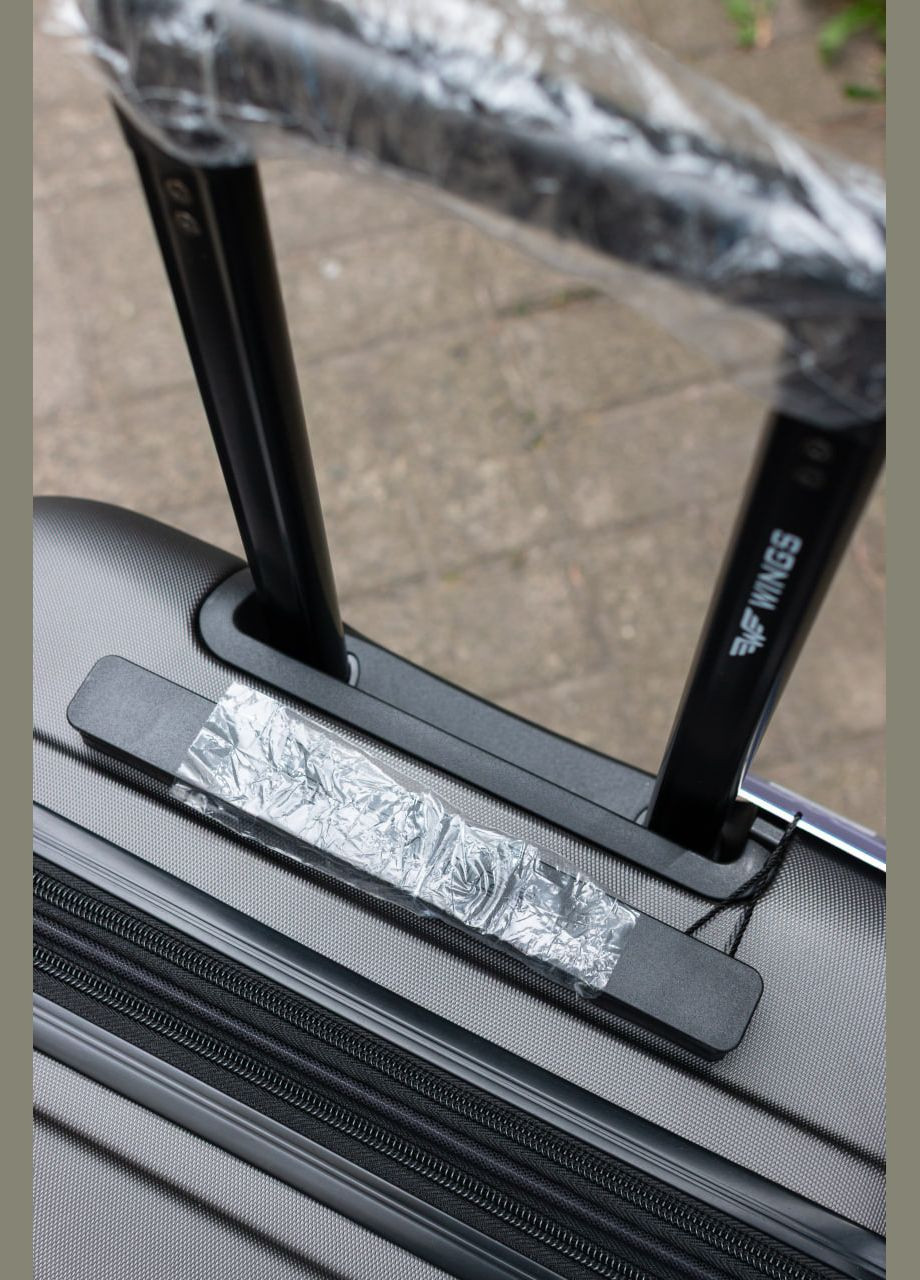 Валіза пластикова великий L з розширенням, колір чорний Wings 149 (346818687)