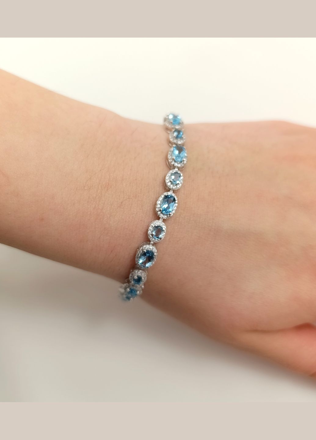 Серебряный браслет с топазом "Swiss Blue", регулируемая застежка-слайдер Б025-ст Shatlen Браслет (328082593)