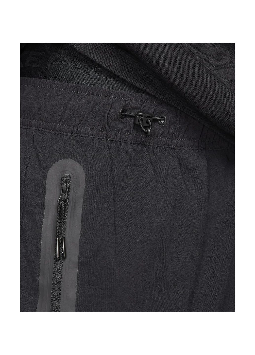 Черные демисезонные брюки Nike