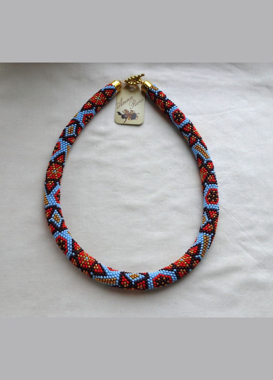 Джгут з бісеру ручної роботи блакитний "Бірюзова казка" No Brand (358224465)