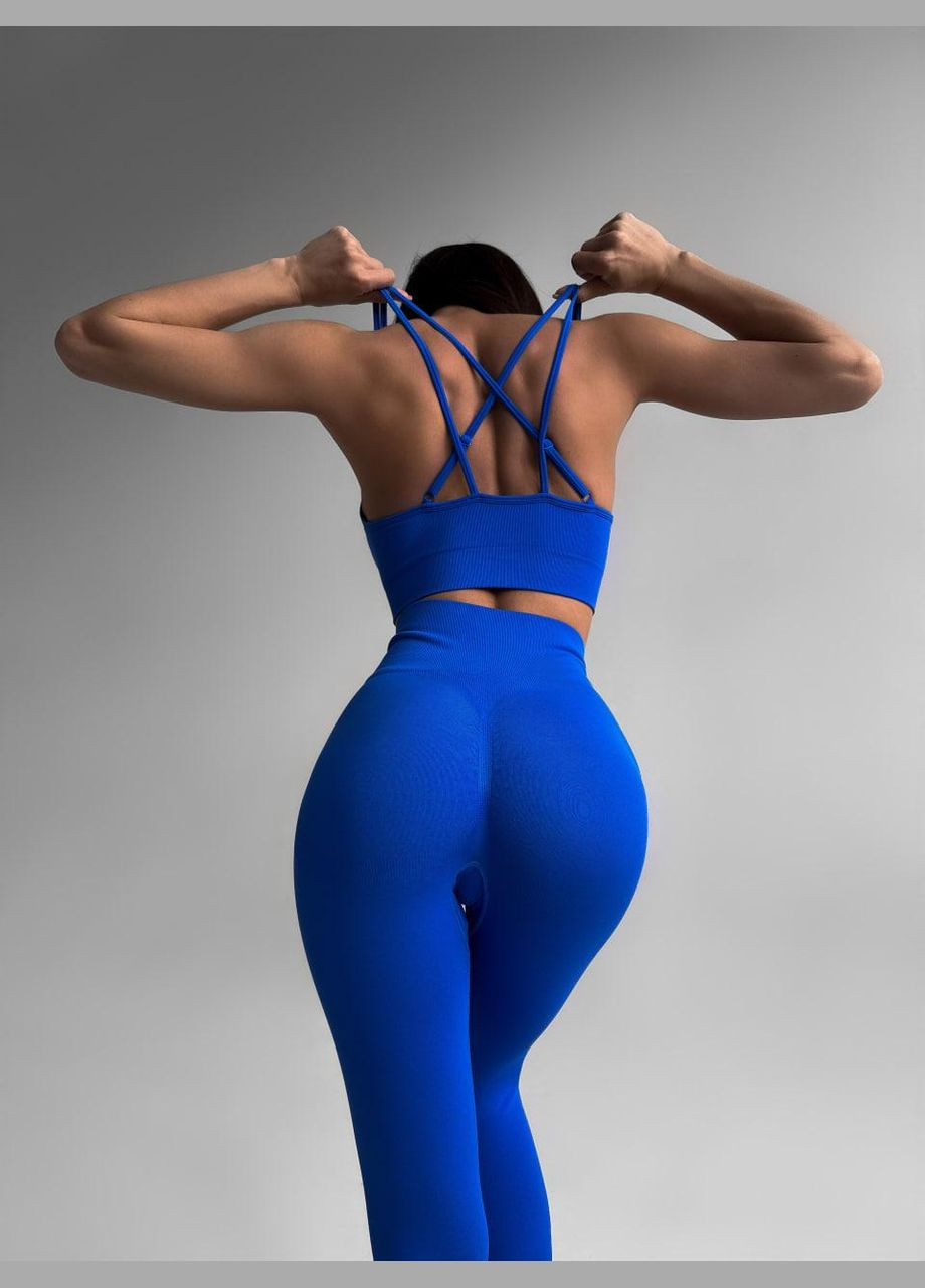 Спортивний костюм (топ на бретелях та легінси) з пуш-ап ефектом синього кольору, розмір S Trends (330757140)
