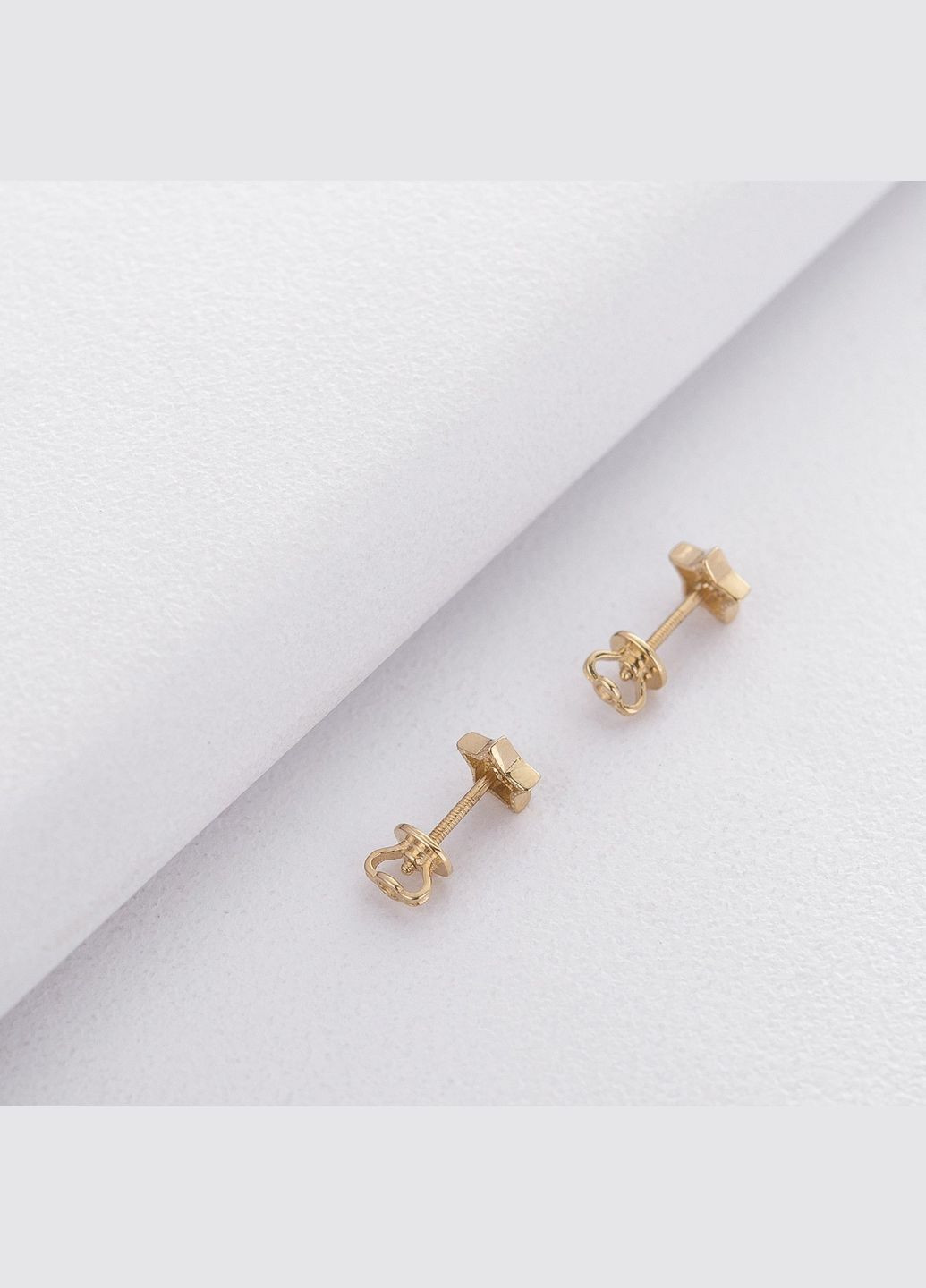 Золоті сережки-гвоздики із зірочками с06193 Oniks (264644704)