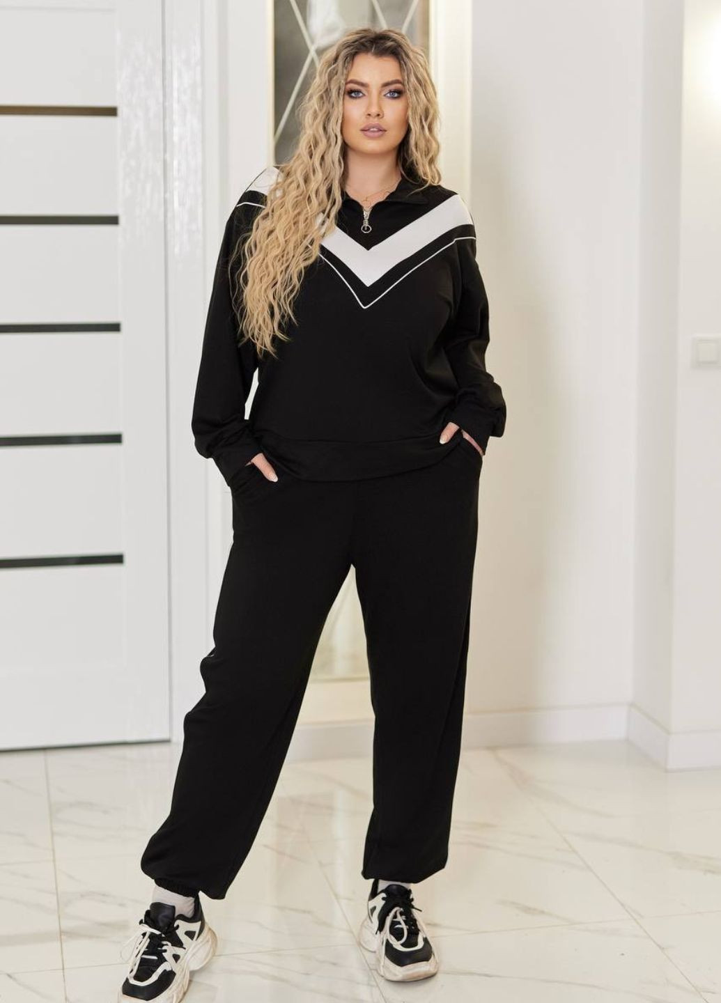 Жіночий спортивний костюм із двонитки з V-подібним вирізом і блискавкою Tik-Tak (340334739)