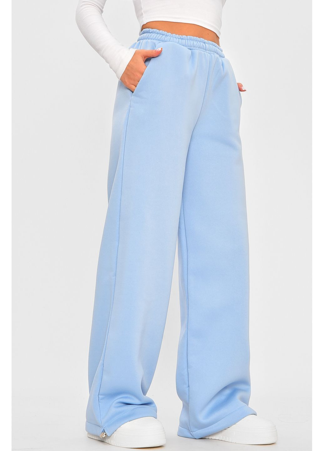 Спортивні штани жіночі на флісі блакитного кольору Let's Shop (364964447)