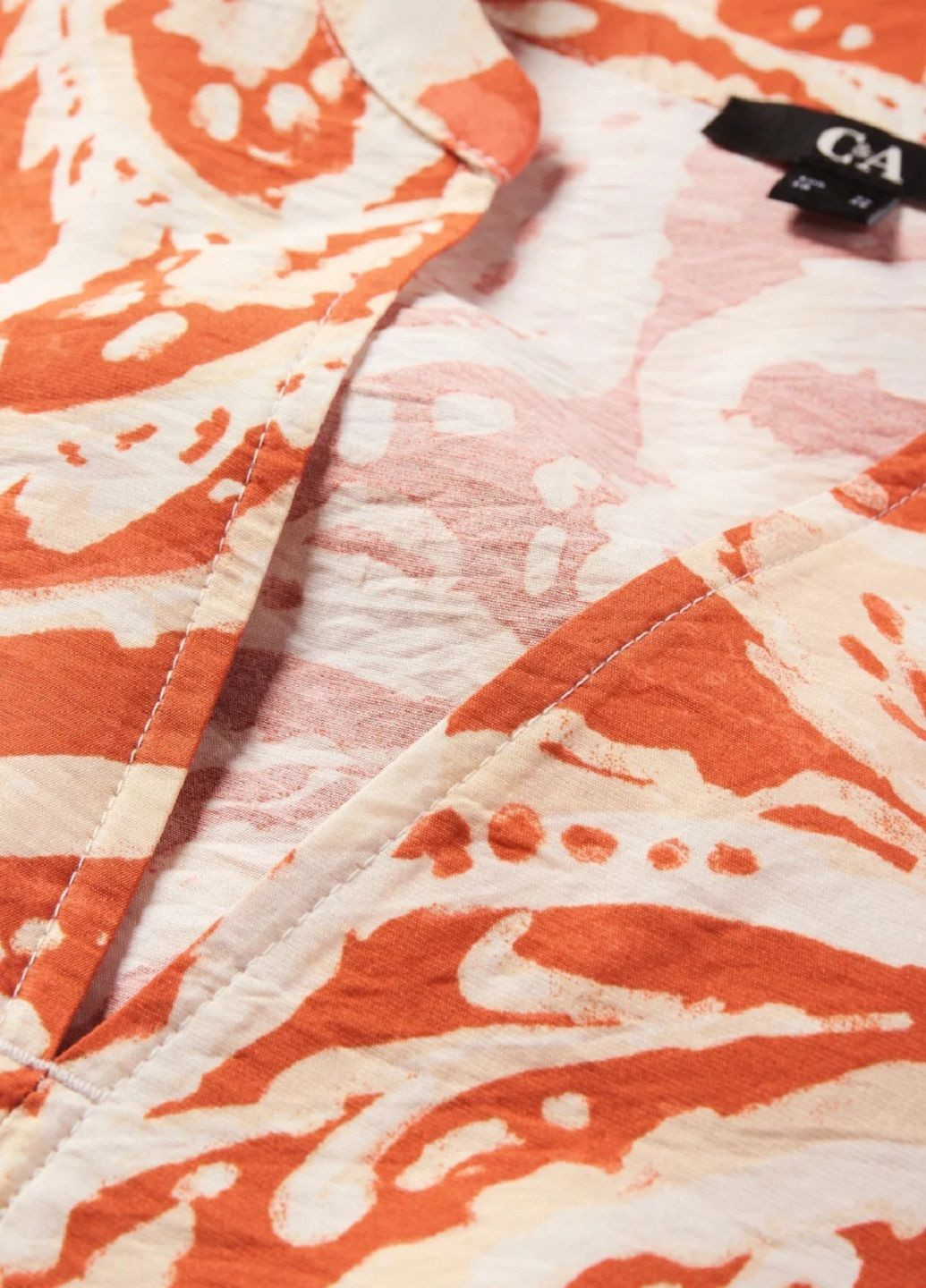 Помаранчева сукня C&A з квітковим принтом