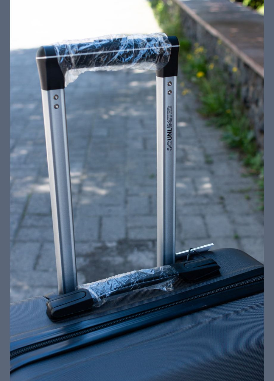 Валіза пластикова 147 Unlimited великий L, колір чорний Wings 147UNL (343339799)