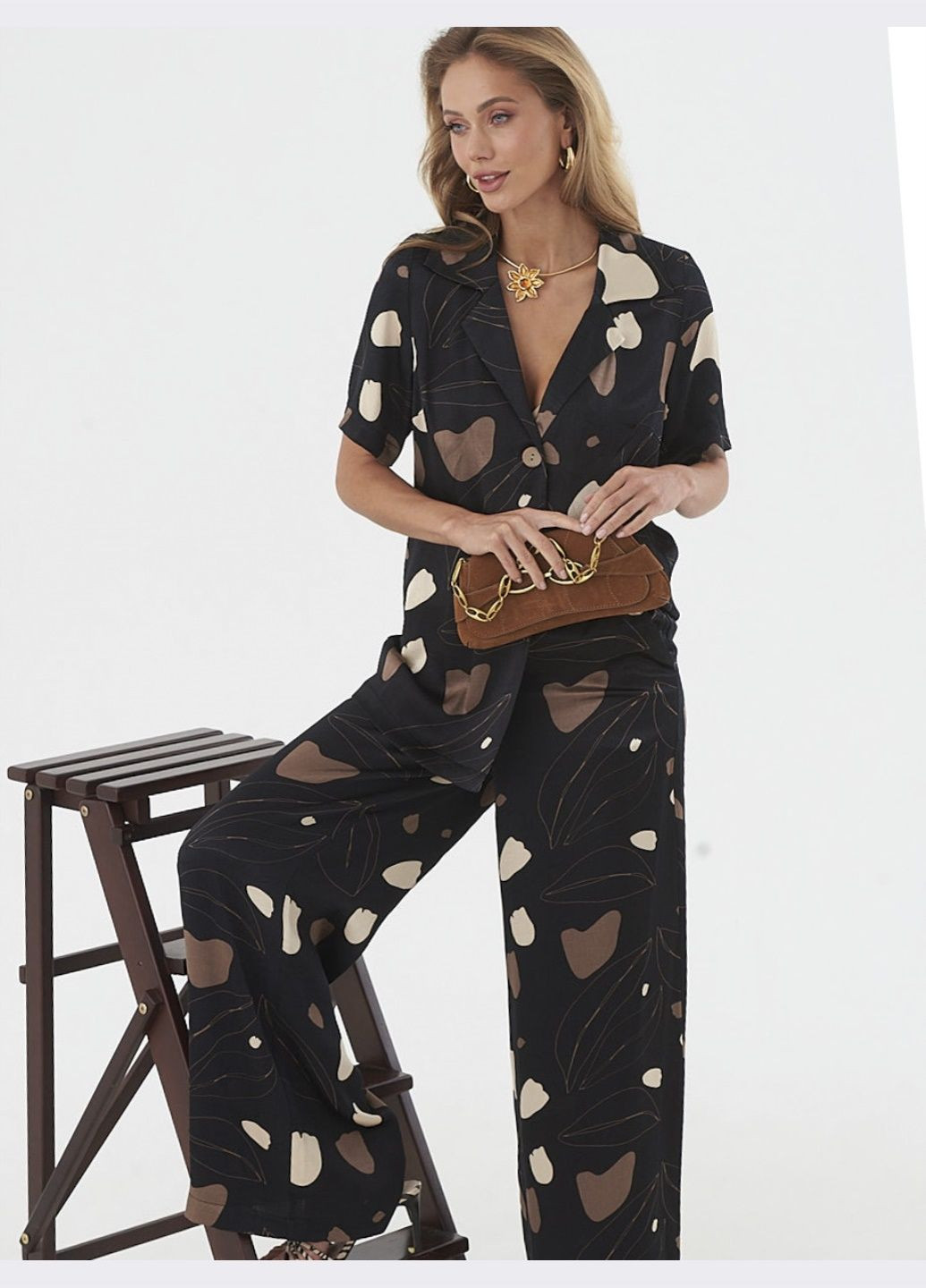 брючний костюм чорного кольору з принтом Dressa (297949183)