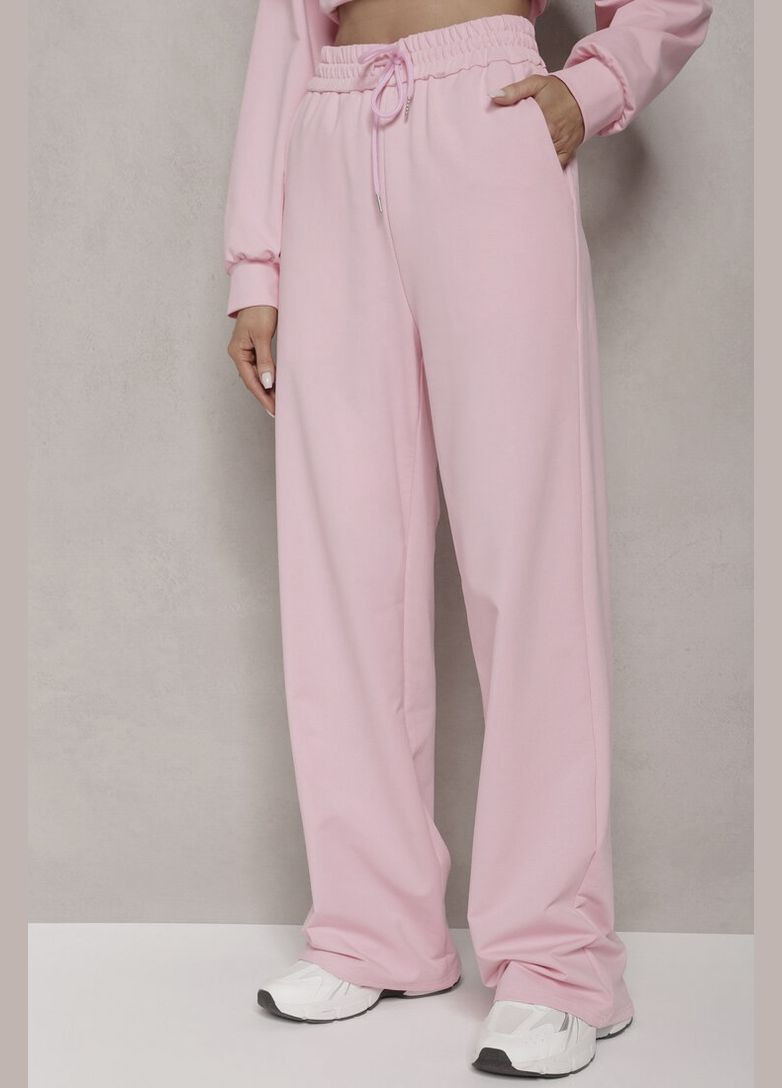 Спортивні штани жіночі рожевого кольору Let's Shop (290981524)