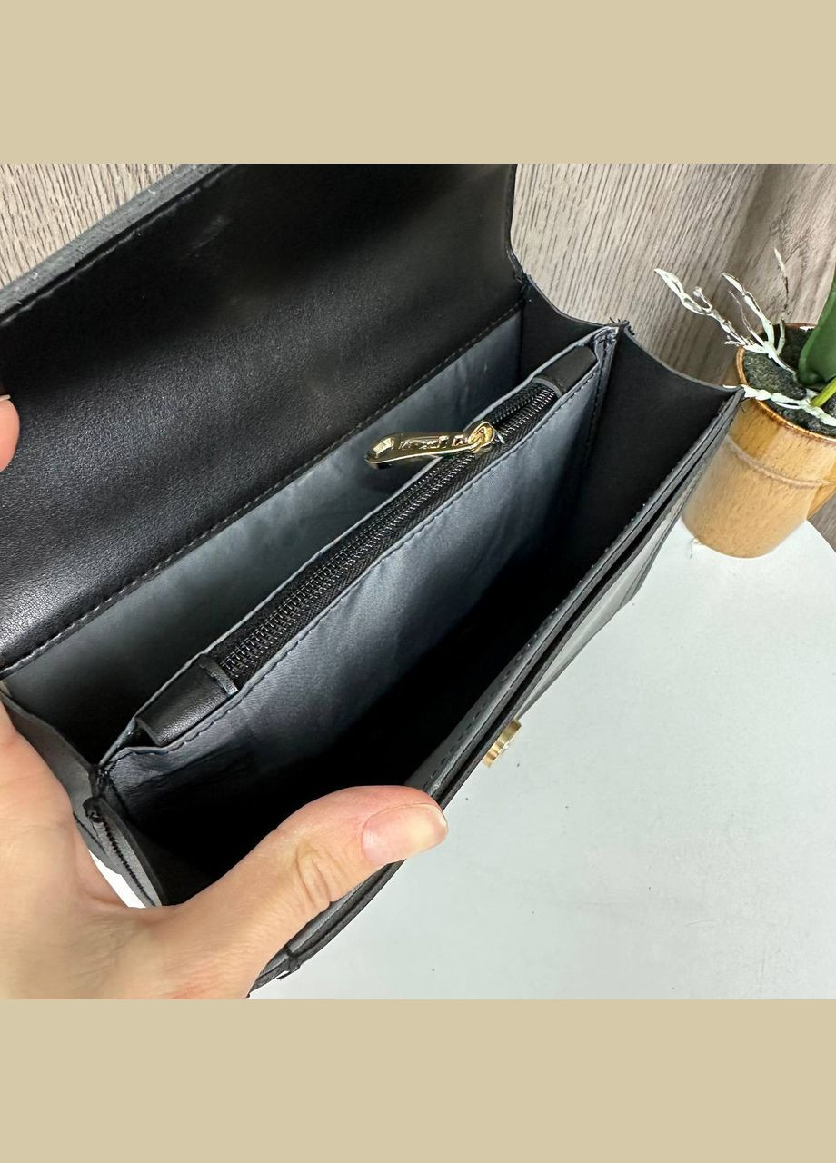 Маленька жіноча сумочка клатч міні сумка на ланцюжку чорна з золотим Eton (314762000)