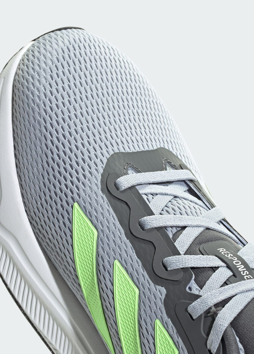 Серые всесезонные кроссовки response adidas