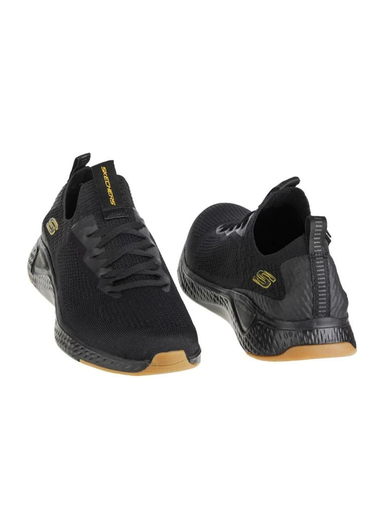 Черные кроссовки мужские solar fuse valedge черные сетчатые с желтым лого размером 40 Skechers