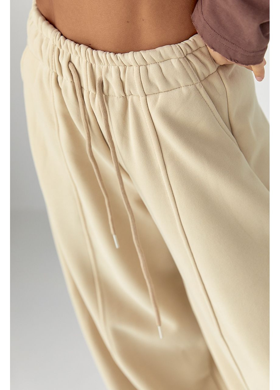 Жіночі теплі спортивні штани Lurex (361432566)