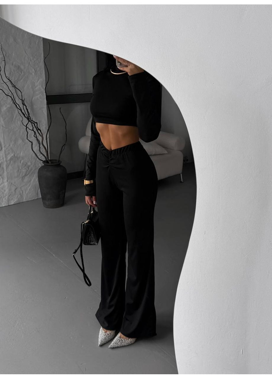 Женский костюм с топом и брюками свободного кроя. Avanti (360640946)