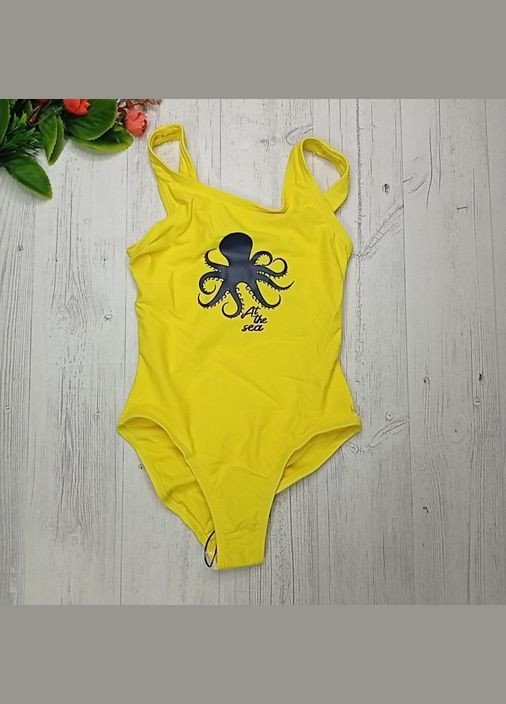 Жовтий літній купальник для дівчинки суцільний Lupilu
