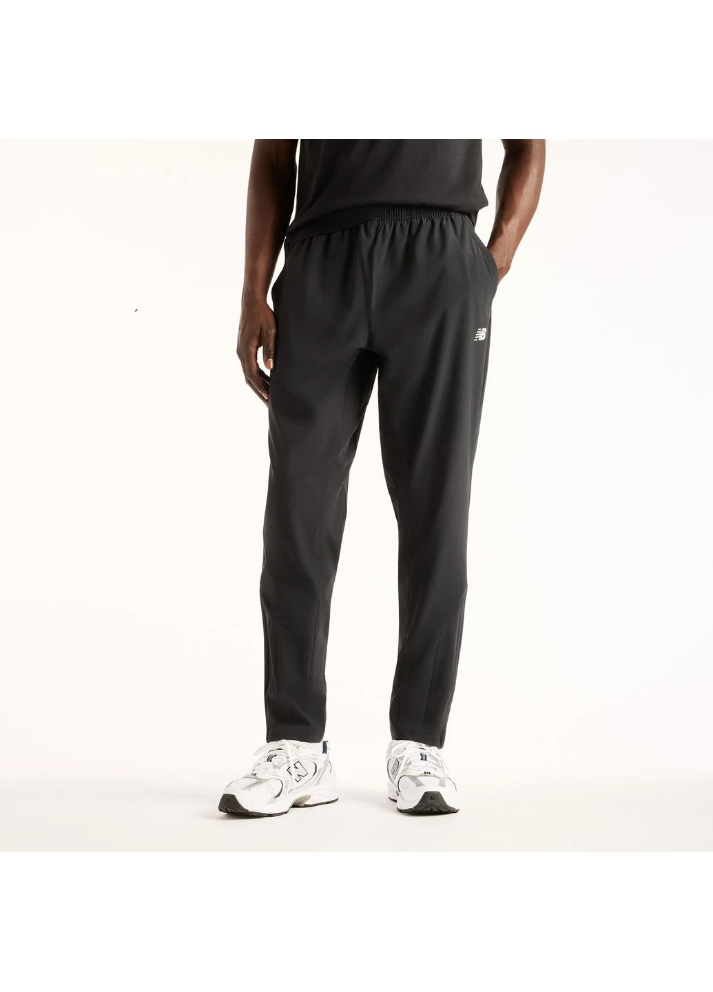 Черные брюки New Balance
