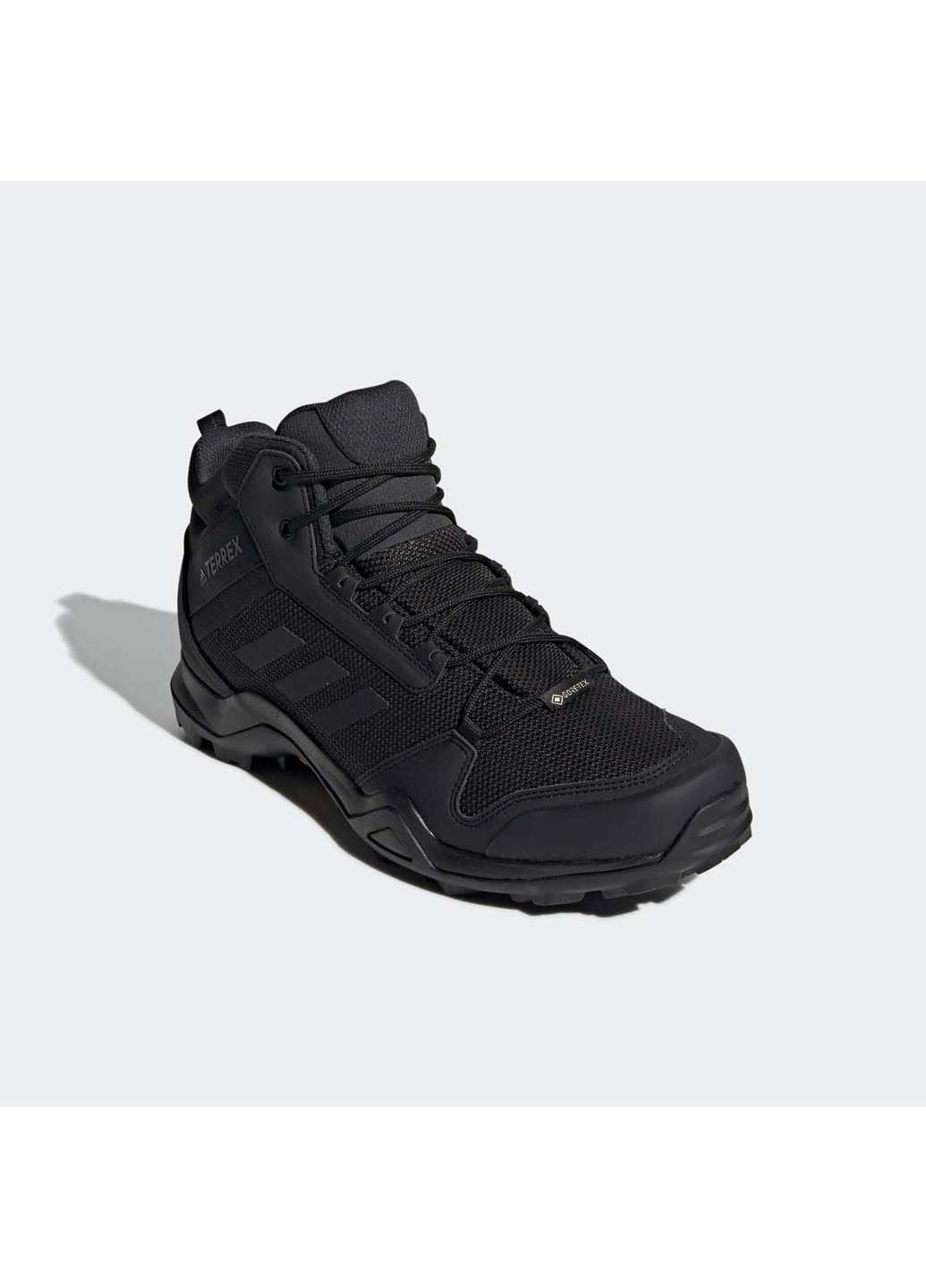 Черные зимние ботинки adidas