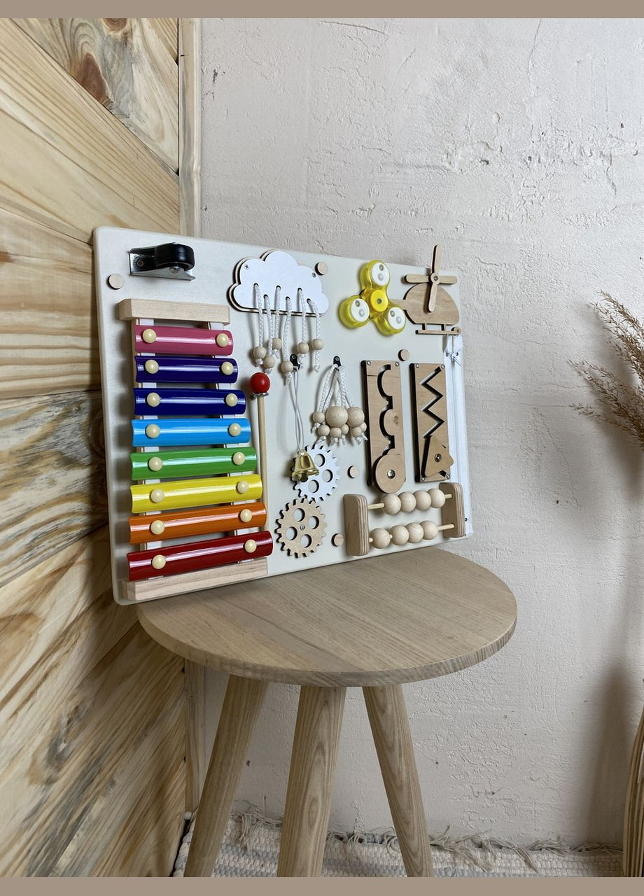 Бізіборд в кольорі дерева з ксилофоном 30х40 см No Brand (348357612)