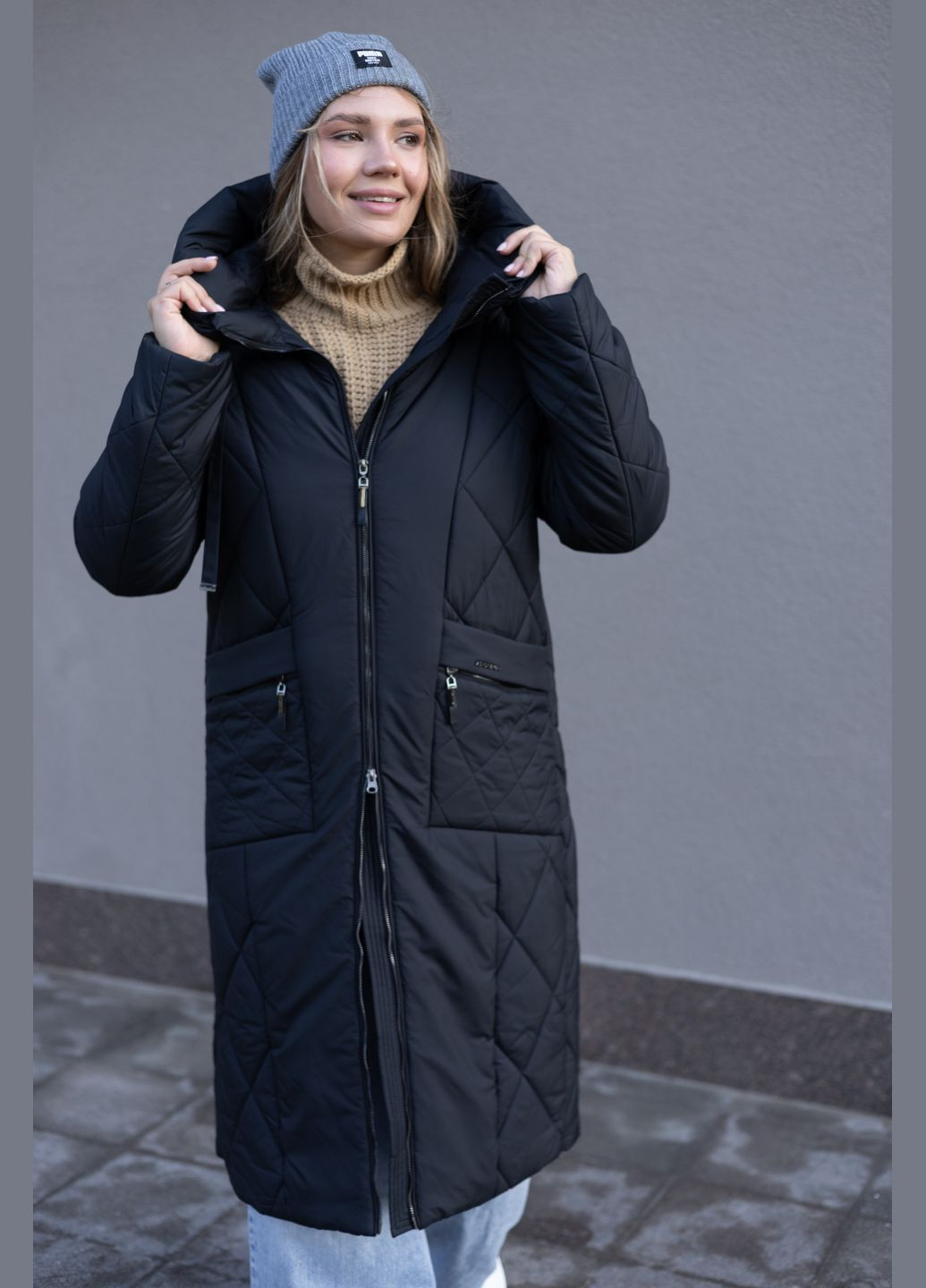 Чорне зимнє Жіноче довге зимове пальто великих розмірів 502852 Delfy