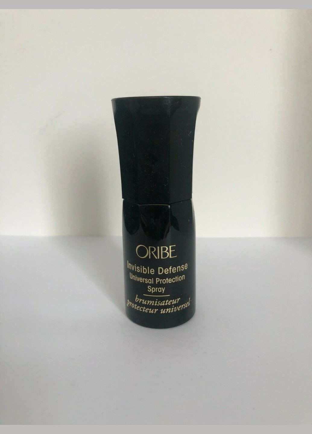 Універсальний захисний спрей для волосся Invisible Defense Universal Protection Spray 20 ml Oribe (286422218)