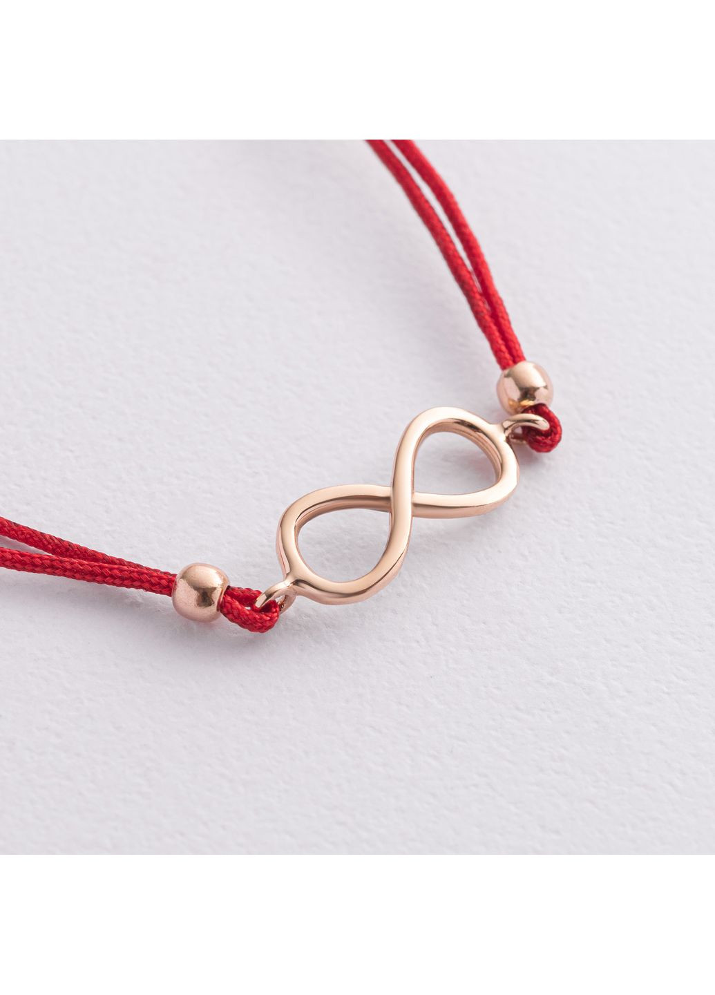 Золотий браслет Нескінченність з червоною ниткою б02719 22 22 Oniks (350612906)