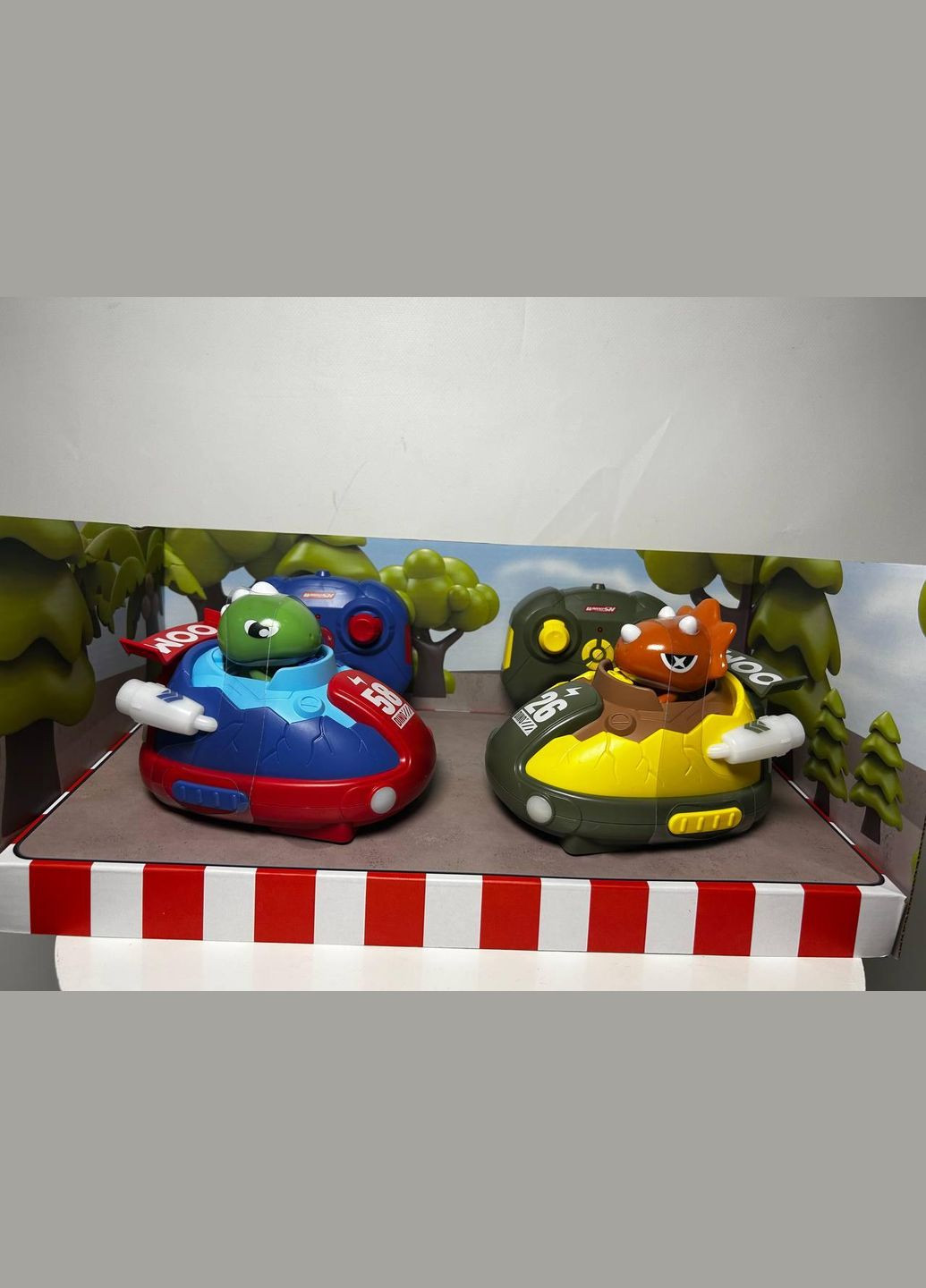 Динозаврики набір машинок на радіокеруванні катапульта 2 шт, фігурки героїв, музика Yi Wu Jiayu (331155252)