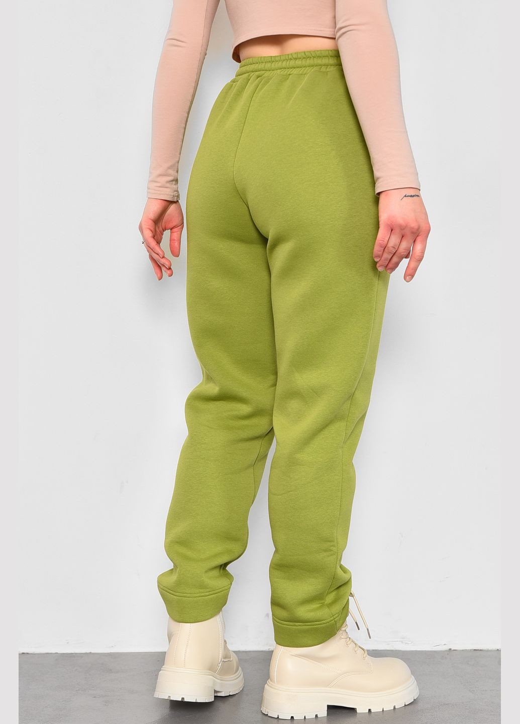 Спортивные штаны женские на флисе салатового цвета Let's Shop (283322876)