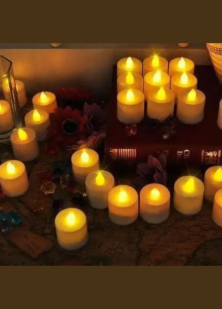 Набор декоративных светодиодных праздничных свечей на батарейках 24 шт. No Brand (305611579)