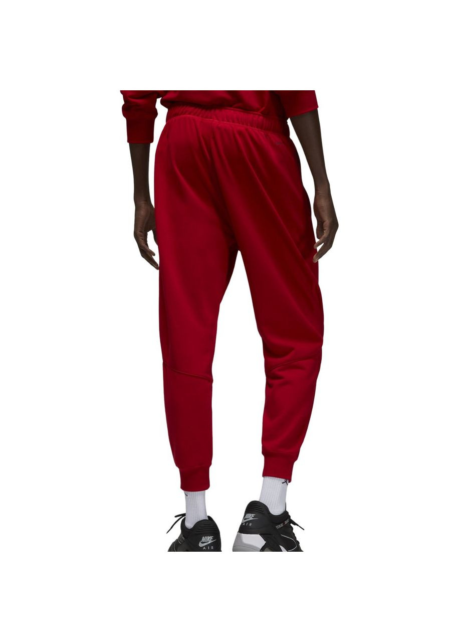 Красные демисезонные брюки Nike
